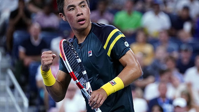 Sep 3, 2022; Flushing, NY, USA; Brandon Nakashima of the United States reacts after winning the first set against Jannik Sinner of Italy on day six of the 2022 U.S. Open tennis tournament at USTA Billie Jean King Tennis Center. Mandatory Credit: Danielle Parhizkaran-USA TODAY Sports