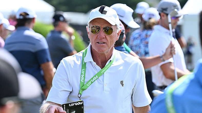 Sep 17, 2022; Chicago, Illinois, USA; Greg Norman greets people on the driving range before the second round of the Invitational Chicago LIV Golf tournament at Rich Harvest Farms. Mandatory Credit: Jamie Sabau-USA TODAY Sports