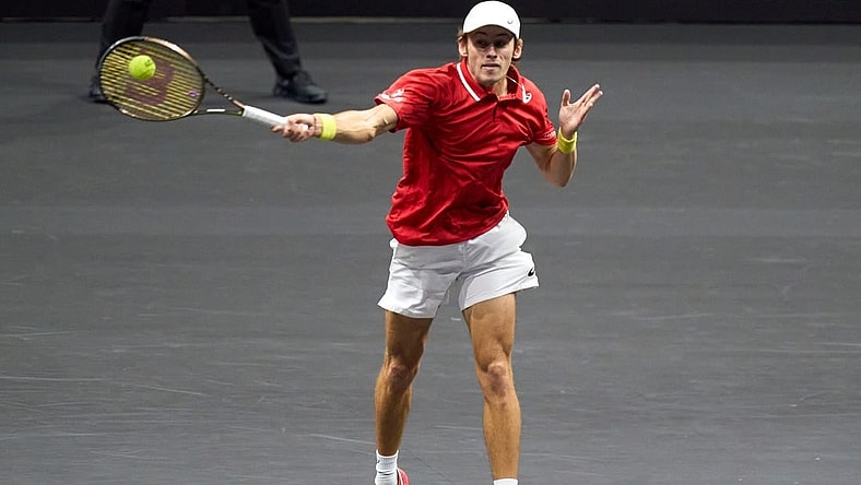 Sep 23, 2022; London, United Kingdom;  Alex De Minaur (AUS) plays a shot against Andy Murray (GBR) in his Laver Cup tennis match.  Mandatory Credit: Peter van den Berg-USA TODAY Sports