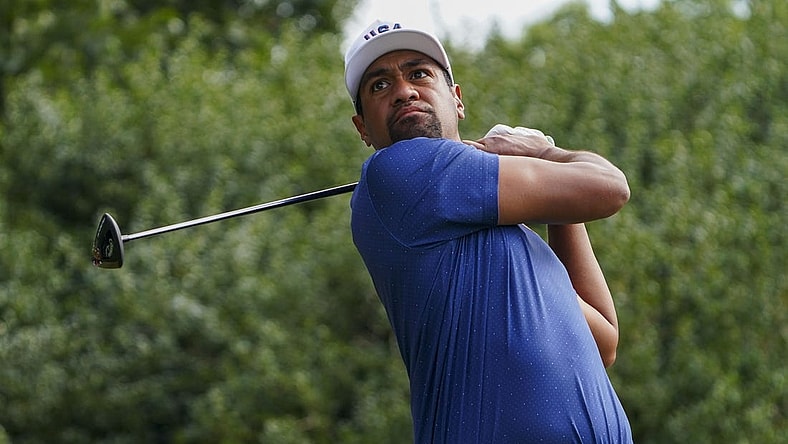 Sep 24, 2022; Charlotte, North Carolina, USA; Team USA golfer Tony Finau hits his tee shot on the 11th hole during the four-ball match play of the Presidents Cup golf tournament at Quail Hollow Club. Mandatory Credit: Peter Casey-USA TODAY Sports