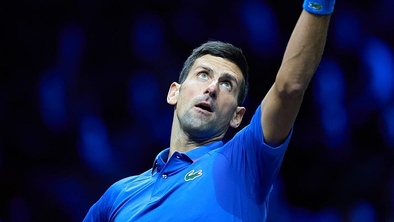 Sep 25, 2022; London, United Kingdom; Novak Djokovic (SRB) serves against Felix Auger-Aliassime (CAN) in Lavers Cup singles. Mandatory Credit: Peter van den Berg-USA TODAY Sports