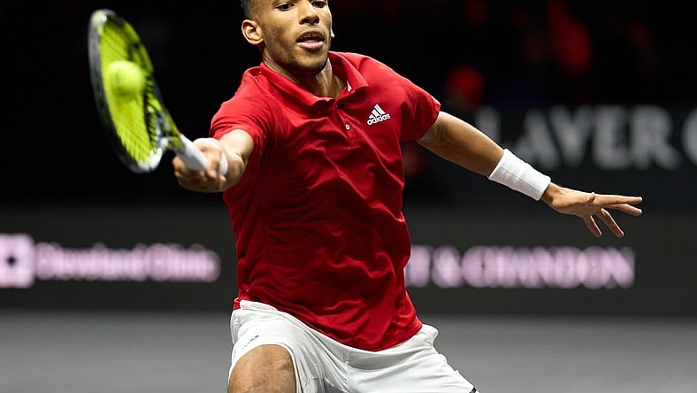 Sep 25, 2022; London, United Kingdom; Felix Auger-Aliassime (CAN) plays a shot against Novak Djokovic (SRB) in Lavers Cup singles. Mandatory Credit: Peter van den Berg-USA TODAY Sports