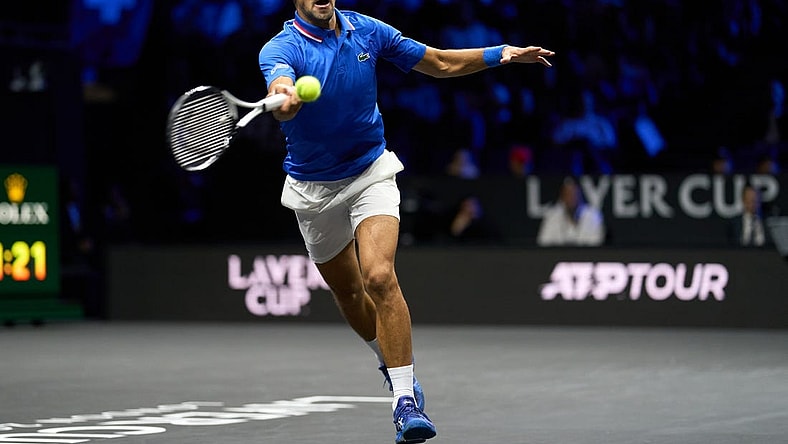 Sep 25, 2022; London, United Kingdom; Novak Djokovic (SRB) plays a shot against Felix Auger-Aliassime (CAN) in Lavers Cup singles. Mandatory Credit: Peter van den Berg-USA TODAY Sports