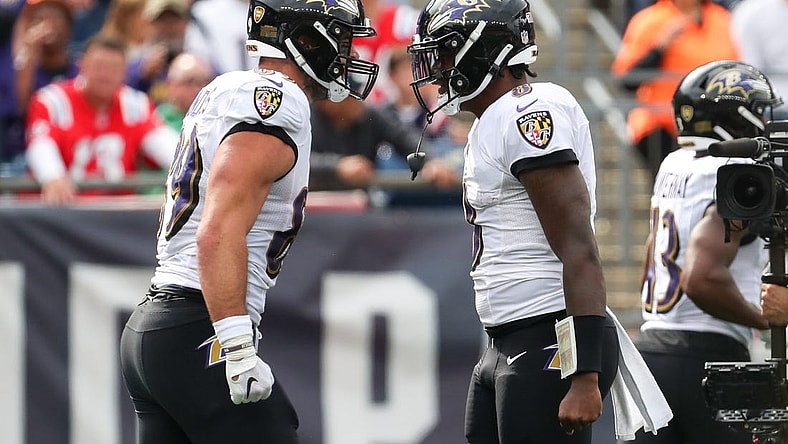 Sep 25, 2022; Foxborough, Massachusetts, USA; Baltimore Ravens quarterback Lamar Jackson (8) and Baltimore Ravens tight end Mark Andrews (89) celebrate after a touchdown during the first half against the New England Patriots at Gillette Stadium. Mandatory Credit: Paul Rutherford-USA TODAY Sports