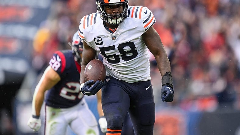 Sep 25, 2022; Chicago, Illinois, USA; Chicago Bears inside linebacker Roquan Smith (58) runs with the ball after an interception in the fourth quarter against the Houston Texans at Soldier Field. Mandatory Credit: Daniel Bartel-USA TODAY Sports