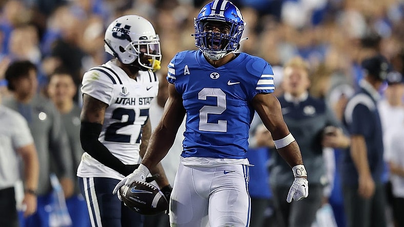 Sep 29, 2022; Provo, Utah, USA; Brigham Young Cougars running back Christopher Brooks (2) reacts in the fourth quarter against the Utah State Aggies at LaVell Edwards Stadium. Mandatory Credit: Rob Gray-USA TODAY Sports