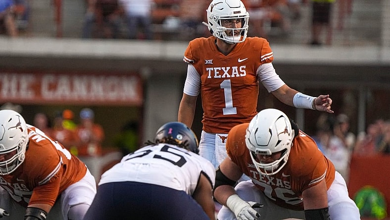 Oct 1, 2022; Austin, Texas, USA; Texas Longhorns quarterback Hudson Card (1) directs the Longhorns offense during a game against the West Virginia Mountaineers at Royal Memorial Stadium. Mandatory Credit: Aaron E. Martinez/American-Statesman via USA TODAY NETWORK