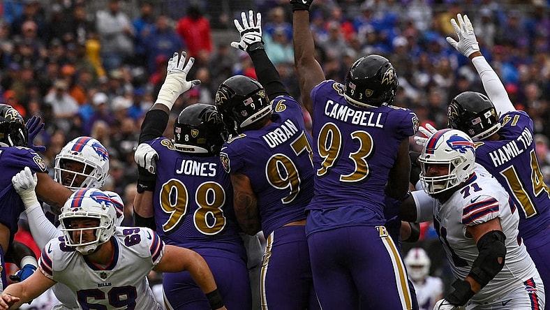 Oct 2, 2022; Baltimore, Maryland, USA;  Buffalo Bills place kicker Tyler Bass (2) first half field goal clears Baltimore Ravens defensive tackle Calais Campbell (93)  tented hand during at M&T Bank Stadium. Mandatory Credit: Tommy Gilligan-USA TODAY Sports