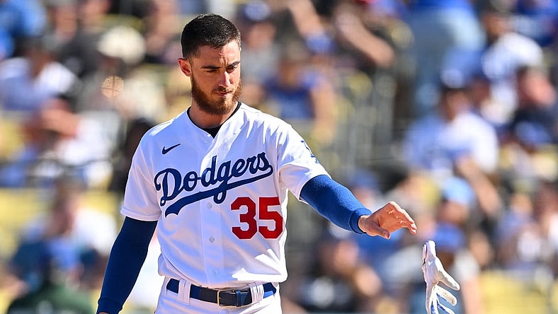 Oct 2, 2022; Los Angeles, California, USA; Los Angeles Dodgers center fielder Cody Bellinger (35) tosses his batting gloves after striking out in the fifth inning against the Colorado Rockies at Dodger Stadium. Mandatory Credit: Jayne Kamin-Oncea-USA TODAY Sports