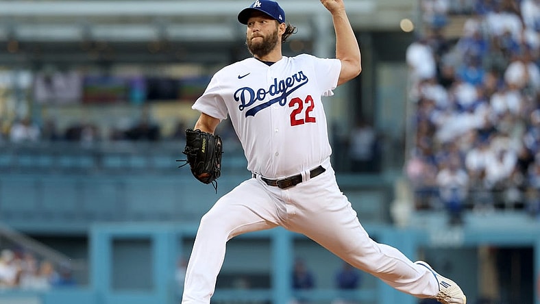 Oct 12, 2022; Los Angeles, California, USA; Los Angeles Dodgers starting pitcher Clayton Kershaw (22) throws in the first inning of game two of the NLDS for the 2022 MLB Playoffs against the San Diego Padres at Dodger Stadium. Mandatory Credit: Kiyoshi Mio-USA TODAY Sports