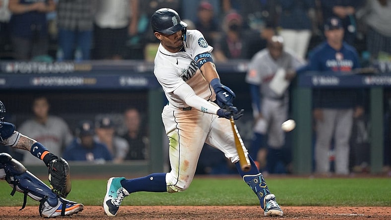 Oct 15, 2022; Seattle, Washington, USA; Seattle Mariners center fielder Julio Rodriguez (44) pops out to end the game in the eighteenth inning against the Houston Astros during game three of the ALDS for the 2022 MLB Playoffs at T-Mobile Park. Mandatory Credit: Steven Bisig-USA TODAY Sports