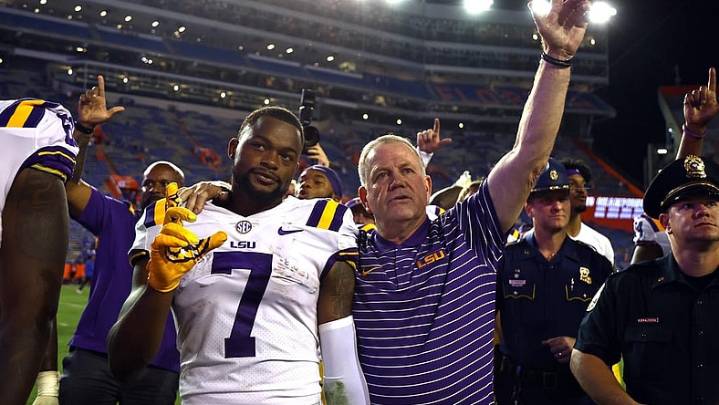 Oct 15, 2022; Gainesville, Florida, USA; LSU Tigers wide receiver Kayshon Boutte (7) and head coach Brian Kelly celebrate after they beat the Florida Gators  at Ben Hill Griffin Stadium. Mandatory Credit: Kim Klement-USA TODAY Sports