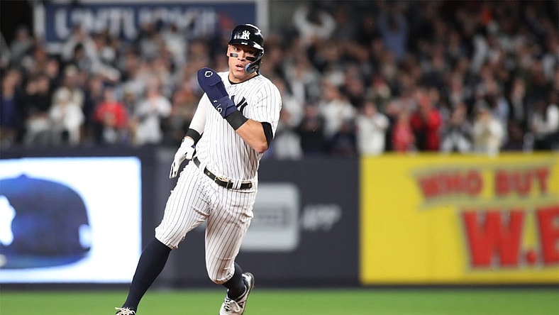 Oct 23, 2022; Bronx, New York, USA; New York Yankees center fielder Aaron Judge (99) rounds second base in the second inning against the Houston Astros during game four of the ALCS for the 2022 MLB Playoffs at Yankee Stadium. Mandatory Credit: Wendell Cruz-USA TODAY Sports