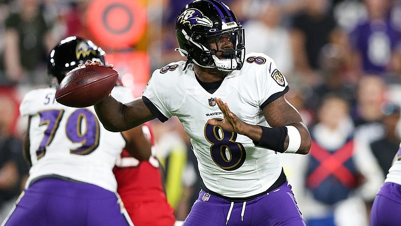 Oct 27, 2022; Tampa, Florida, USA;  Baltimore Ravens quarterback Lamar Jackson (8) drops back to pass against the Tampa Bay Buccaneers in the first quarter at Raymond James Stadium. Mandatory Credit: Nathan Ray Seebeck-USA TODAY Sports