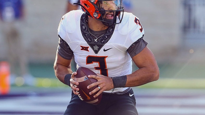 Oct 29, 2022; Manhattan, Kansas, USA; Oklahoma State Cowboys quarterback Spencer Sanders (3) drops back to pass against the Kansas State Wildcats during the first quarter at Bill Snyder Family Football Stadium. Mandatory Credit: Scott Sewell-USA TODAY Sports