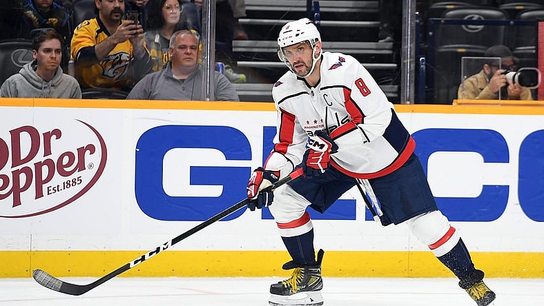 Oct 29, 2022; Nashville, Tennessee, USA; Washington Capitals left wing Alex Ovechkin (8) controls the puck against the Nashville Predators during the second period at Bridgestone Arena. Mandatory Credit: Christopher Hanewinckel-USA TODAY Sports