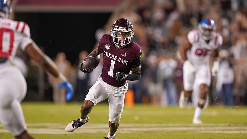 Oct 29, 2022; College Station, Texas, USA; Texas A&M Aggies wide receiver Evan Stewart (1) runs the ball against the Mississippi Rebels in the second half at Kyle Field. Mandatory Credit: Daniel Dunn-USA TODAY Sports