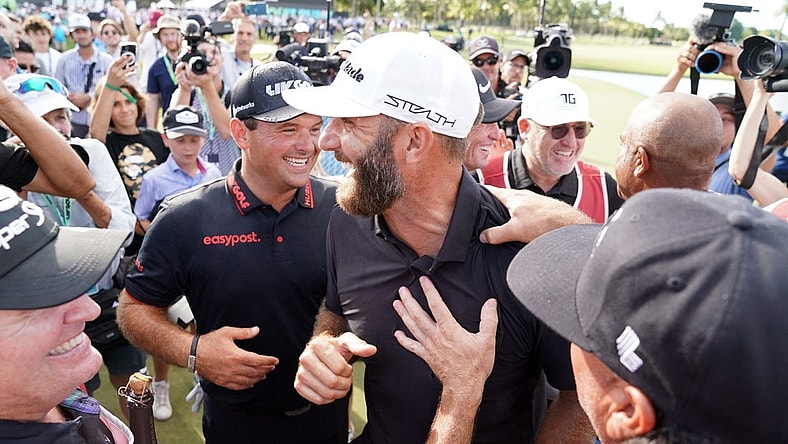Oct 30, 2022; Miami, Florida, USA; Patrick Reed and Dustin Johnson celebrate with team 4Aces GC after winning the season finale of the LIV Golf series at Trump National Doral. Mandatory Credit: John David Mercer-USA TODAY Sports