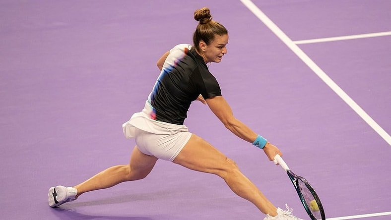 Oct 31, 2022; Forth Worth, TX, USA; Maria Sakkari (GRE) returns a shot during her match against Jessica Pegula (USA) on day one of the WTA Finals at Dickies Arena. Mandatory Credit: Susan Mullane-USA TODAY Sports