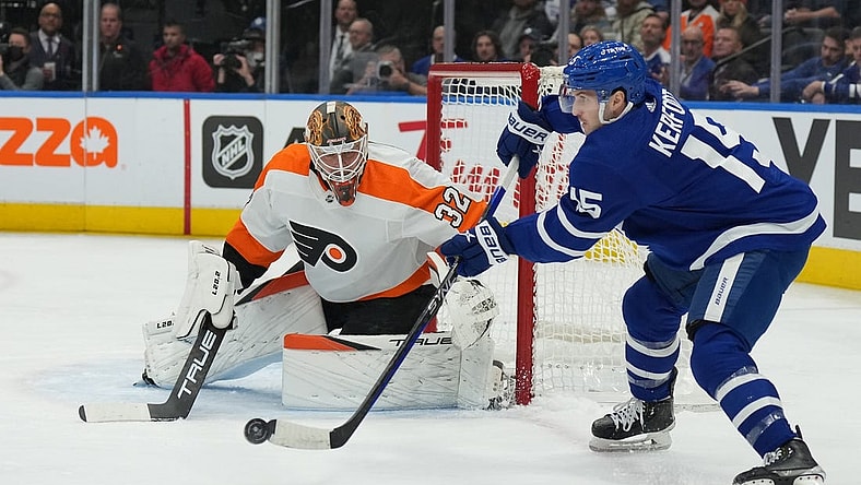 Nov 2, 2022; Toronto, Ontario, CAN; Toronto Maple Leafs center Alexander Kerfoot (15) passes in front of Philadelphia Flyers goaltender Felix Sandstrom (32) during the first period at Scotiabank Arena. Mandatory Credit: Nick Turchiaro-USA TODAY Sports