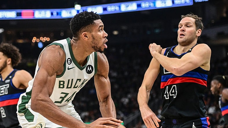 Nov 2, 2022; Milwaukee, Wisconsin, USA; Milwaukee Bucks forward Giannis Antetokounmpo (34) looks to shoot against Detroit Pistons forward Bojan Bogdanovic (44) in the first quarter at Fiserv Forum. Mandatory Credit: Benny Sieu-USA TODAY Sports