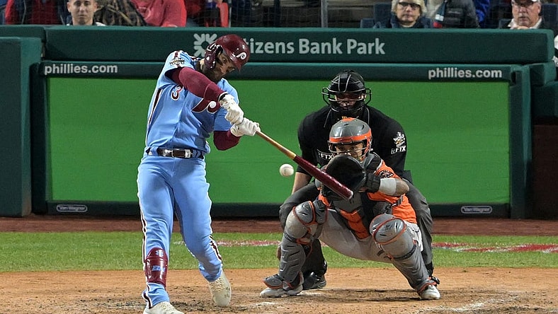 Nov 3, 2022; Philadelphia, Pennsylvania, USA; Philadelphia Phillies designated hitter Bryce Harper (3) hits a double against the Houston Astros during the fifth inning in game five of the 2022 World Series at Citizens Bank Park. Mandatory Credit: John Geliebter-USA TODAY Sports