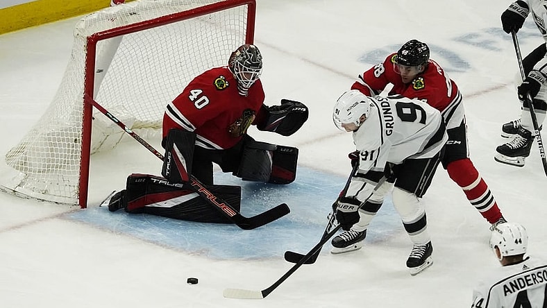Nov 3, 2022; Chicago, Illinois, USA; Los Angeles Kings right wing Carl Grundstrom (91) skates in on Chicago Blackhawks goaltender Arvid Soderblom (40) during the second period at United Center. Mandatory Credit: David Banks-USA TODAY Sports
