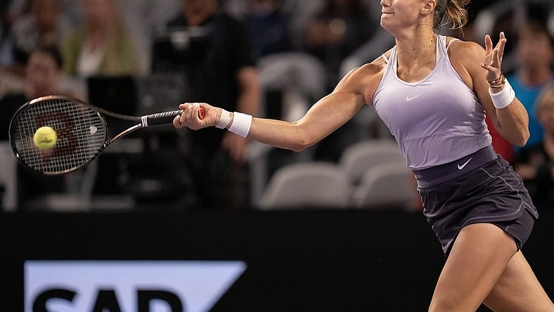 Nov 4, 2022; Forth Worth, TX, USA; Aryna Sabalenka returns a shot during her match against Jessica Pegula (USA) on day five of the WTA Finals at Dickies Arena. Mandatory Credit: Susan Mullane-USA TODAY Sports