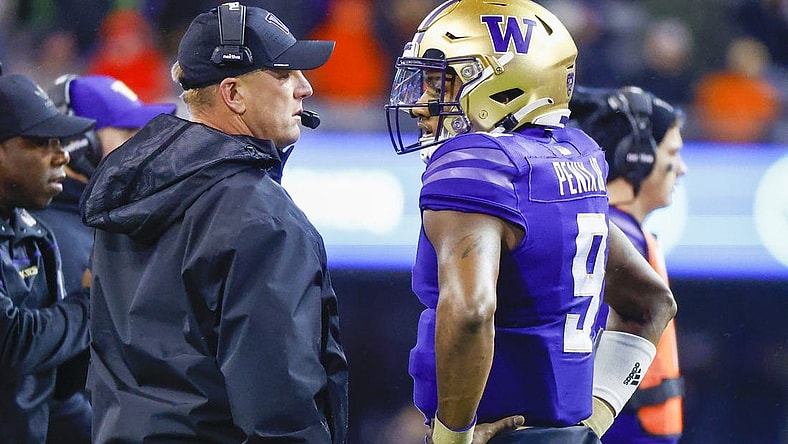 Nov 4, 2022; Seattle, Washington, USA; Washington Huskies head coach Kalen DeBoer talks with quarterback Michael Penix Jr. (9) during a fourth quarter timeout at Alaska Airlines Field at Husky Stadium. Mandatory Credit: Joe Nicholson-USA TODAY Sports
