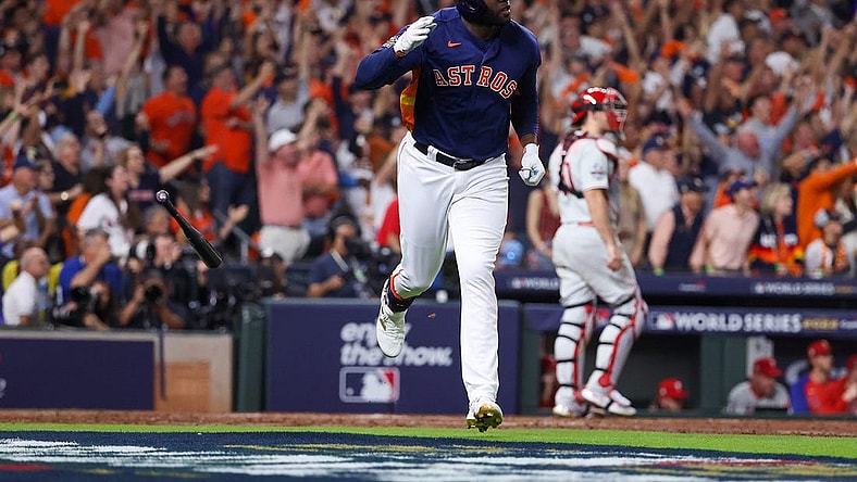 Nov 5, 2022; Houston, Texas, USA; Houston Astros left fielder Yordan Alvarez (44) flips his bat after hitting a three run against the Philadelphia Phillies during the sixth inning  in game six of the 2022 World Series at Minute Maid Park. Mandatory Credit: Troy Taormina-USA TODAY Sports