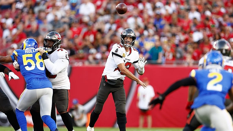 Nov 6, 2022; Tampa, Florida, USA; Tampa Bay Buccaneers quarterback Tom Brady (12) looks to pass the ball against the Los Angeles Rams during the first quarter at Raymond James Stadium. Mandatory Credit: Douglas DeFelice-USA TODAY Sports