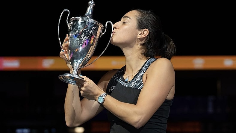 Nov 7, 2022; Forth Worth, TX, USA; Caroline Garcia (FRA) kisses the trophy after winning the WTA Finals in singles after defeating Aryna Sabalenka on day eight of the WTA Finals at Dickies Arena.