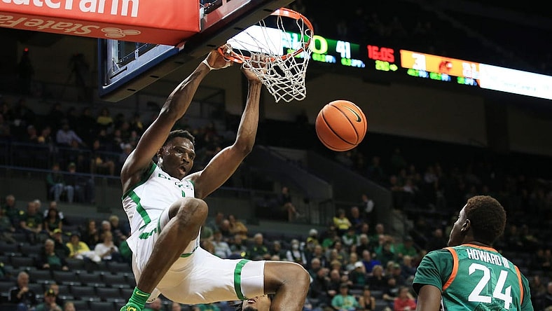 Oregon's N'Faly Dante, left, dunks the ball over Florida A&M 's Wylie Howard III during the second half at Matthew Knight Arena Nov 7, 2022.

Ncaa Mens Basketball Eug Uombb Vs Florida A M At Oregon