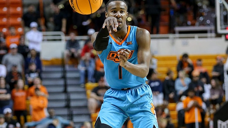 Oklahoma State guard Bryce Thompson (1) passes the ball in the second half during a college basketball game between the Oklahoma State Cowboys (OSU) and the Southern Illinois Salukis at Gallagher-Iba Arena in Stillwater, Okla., Thursday, Nov. 10, 2022.

Osu Vs Southern Illinois