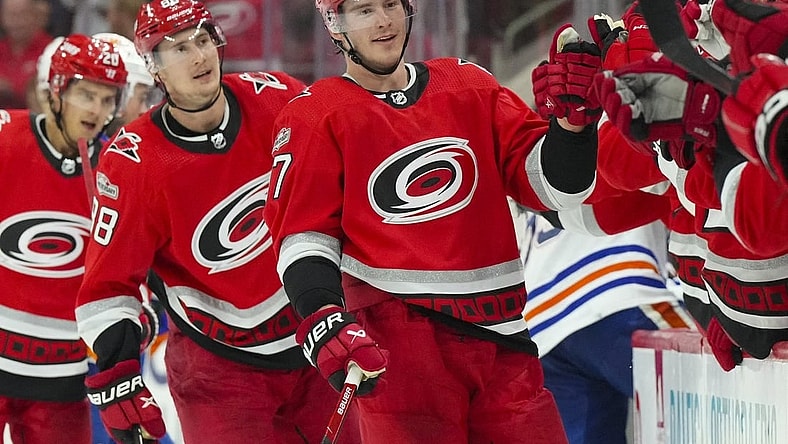 Nov 10, 2022; Raleigh, North Carolina, USA; Carolina Hurricanes right wing Andrei Svechnikov (37) celebrates his third goal of the game against the Edmonton Oilers during the third period at PNC Arena. Mandatory Credit: James Guillory-USA TODAY Sports