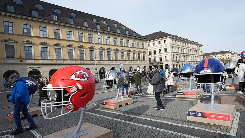 Nov 11, 2022; Munich, Germany; Large helmets of the Kansas City Chiefs, Dallas Cowboys and New York Giants during fan activation event at Odeonsplatz. Mandatory Credit: Kirby Lee-USA TODAY Sports