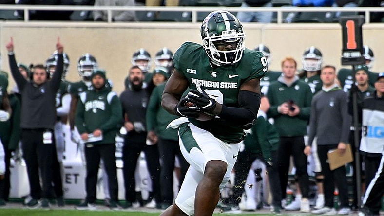 Nov 12, 2022; East Lansing, Michigan, USA;  Michigan State Spartans tight end Daniel Barker (9) sprints upfield for a touchdown in the first quarter at Spartan Stadium. Mandatory Credit: Dale Young-USA TODAY Sports