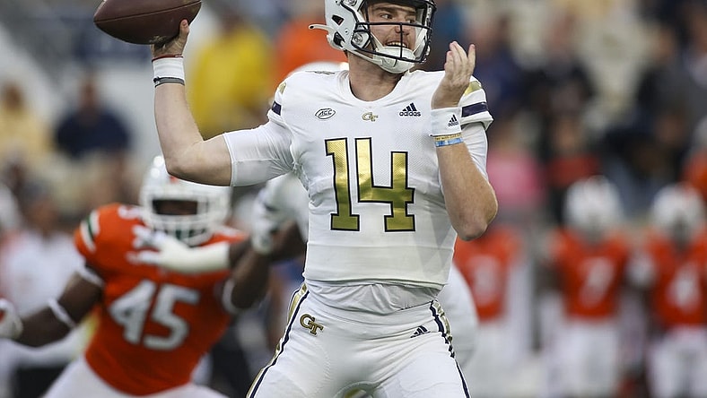 Nov 12, 2022; Atlanta, Georgia, USA; Georgia Tech Yellow Jackets quarterback Zach Pyron (14) throws a pass against the Miami Hurricanes in the first quarter at Bobby Dodd Stadium. Mandatory Credit: Brett Davis-USA TODAY Sports