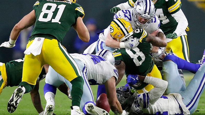 Green Bay Packers wide receiver Amari Rodgers (8) fumbles a punt return against the Dallas Cowboys during their football game Sunday, November 13, at Lambeau Field in Green Bay, Wis. Dallas recovered the fumble.Dan Powers/USA TODAY NETWORK-Wisconsin

Apc Packvscowboys 1113221314djp