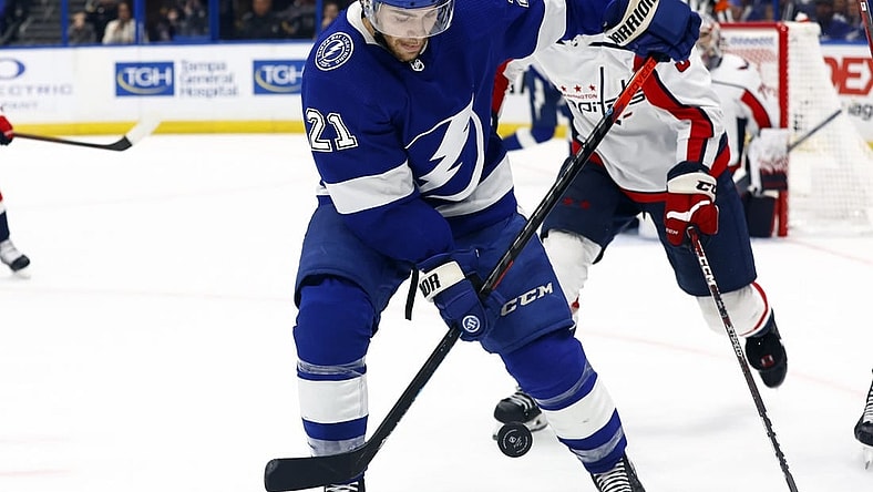 Nov 13, 2022; Tampa, Florida, USA; Tampa Bay Lightning center Brayden Point (21) skates after the puck against the Washington Capitals during the third period at Amalie Arena. Mandatory Credit: Kim Klement-USA TODAY Sports