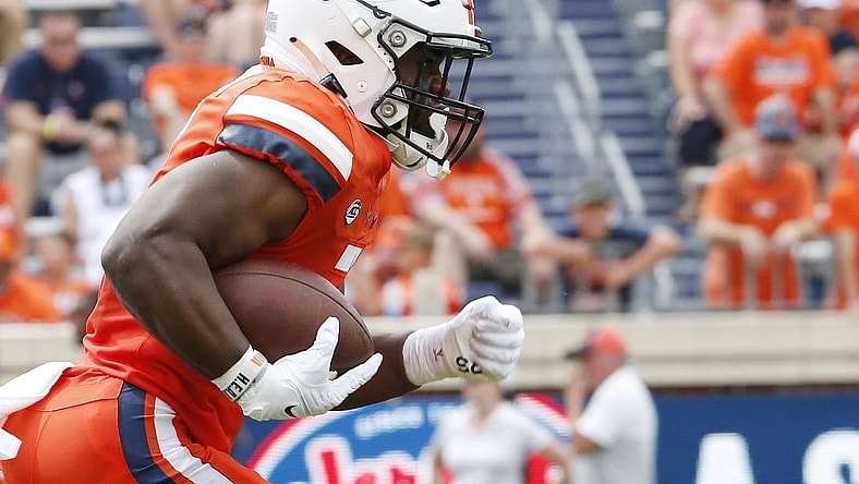 Sep 3, 2022; Charlottesville, Virginia, USA; Virginia Cavaliers running back Mike Hollins (7) carries the ball during the first half against the Richmond Spiders at Scott Stadium. Mandatory Credit: Amber Searls-USA TODAY Sports