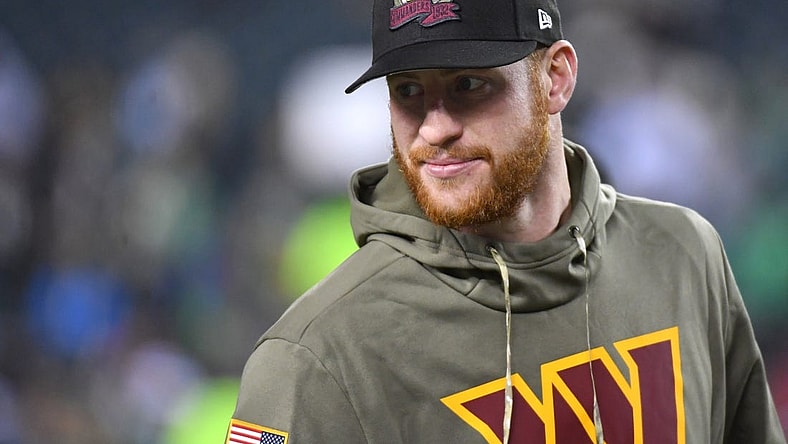 Nov 14, 2022; Philadelphia, Pennsylvania, USA; Washington Commanders quarterback Carson Wentz (11) during warmups against the Philadelphia Eagles at Lincoln Financial Field. Mandatory Credit: Eric Hartline-USA TODAY Sports
