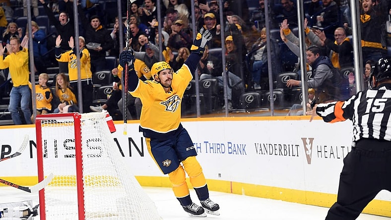 Nov 17, 2022; Nashville, Tennessee, USA; Nashville Predators left wing Filip Forsberg (9) celebrates after a goal during the first period against the New York Islanders at Bridgestone Arena. Mandatory Credit: Christopher Hanewinckel-USA TODAY Sports