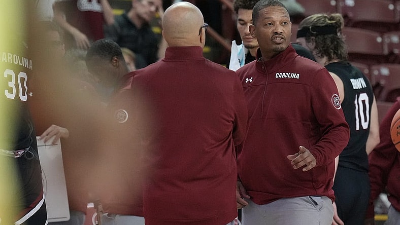 Nov 18, 2022; Charleston, South Carolina, USA; South Carolina Gamecocks head coach Lamont Paris talks with his staff in the second half against the Davidson Wildcats at TD Arena. Mandatory Credit: David Yeazell-USA TODAY Sports