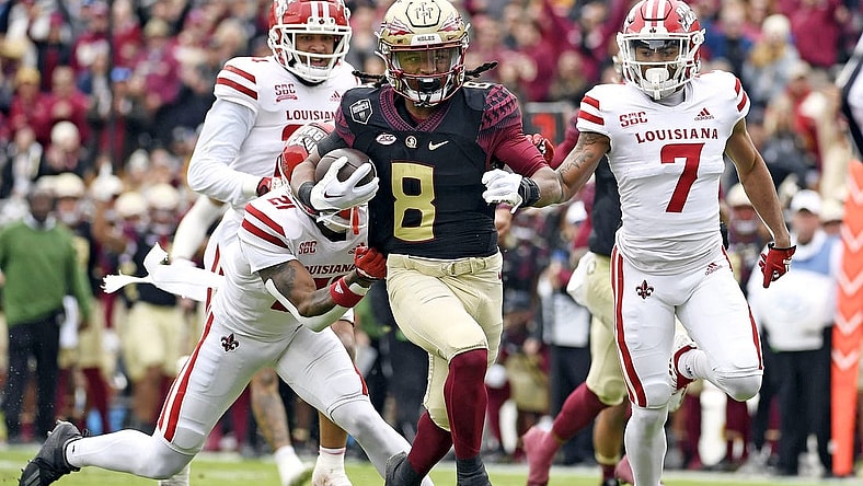Nov 19, 2022; Tallahassee, Florida, USA; Florida State Seminoles running back Treshaun Ward (8) runs the ball for a touchdown during the first half of the game against the Louisiana Ragin' Cajuns at Doak S. Campbell Stadium. Mandatory Credit: Melina Myers-USA TODAY Sports