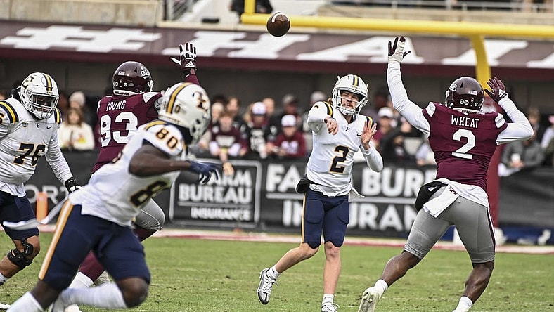 Nov 19, 2022; Starkville, Mississippi, USA; East Tennessee State Buccaneers quarterback Tyler Riddell (2) makes a pass against the Mississippi State Bulldogs during the first quarter at Davis Wade Stadium at Scott Field. Mandatory Credit: Matt Bush-USA TODAY Sports