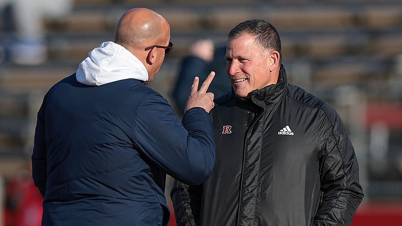 Nov 19, 2022; Piscataway, New Jersey, USA; Penn State Nittany Lions head coach James Franklin (left) talks with Rutgers Scarlet Knights head coach Greg Schiano before the game at SHI Stadium. Mandatory Credit: Vincent Carchietta-USA TODAY Sports