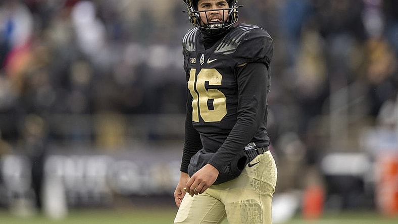 Nov 19, 2022; West Lafayette, Indiana, USA; Purdue Boilermakers quarterback Aidan O'Connell (16) looks up at the scoreboard after calling a timeout during the second half against the Northwestern Wildcats at Ross-Ade Stadium. Mandatory Credit: Marc Lebryk-USA TODAY Sports