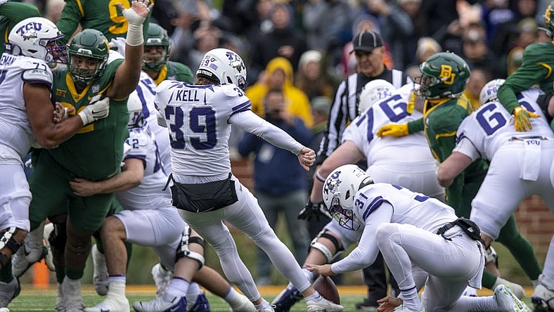 Nov 19, 2022; Waco, Texas, USA; TCU Horned Frogs place kicker Griffin Kell (39) kicks the game winning field goal against the Baylor Bears as time expires in the game at McLane Stadium. Mandatory Credit: Jerome Miron-USA TODAY Sports
