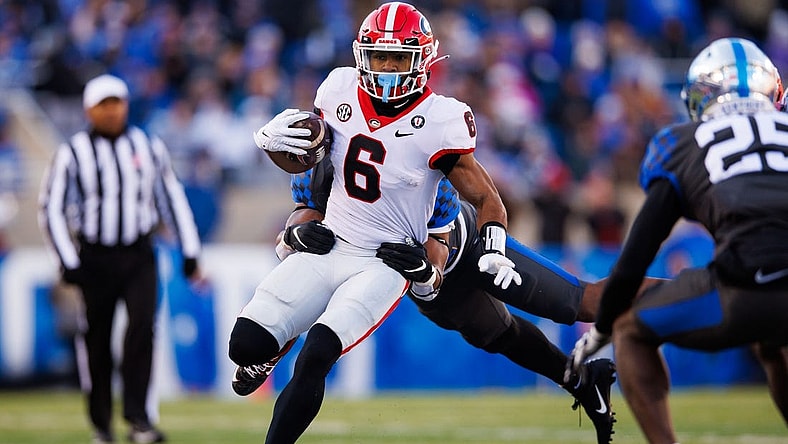 Nov 19, 2022; Lexington, Kentucky, USA; Georgia Bulldogs running back Kenny McIntosh (6) runs the ball during the first quarter against the Kentucky Wildcats at Kroger Field. Mandatory Credit: Jordan Prather-USA TODAY Sports